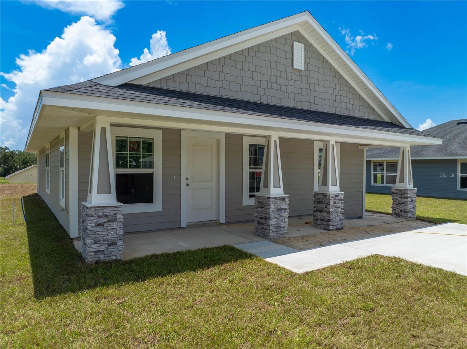 Under Construction. 25k to cover closing costs, rate buy down or upgrades with builder incentives and preferred lenders. only 1,000 deposit to reserve this home. Brand-new 3-bedroom, 2-bath home in the heart of Bell, FL! This beautifully designed 1,309 sq. ft. residence offers modern finishes, and a large front covered porch making it perfect for both relaxation and entertaining. The spacious kitchen features soft-close solid wood cabinets, brushed nickel faucets, and energy-efficient LED lighting.Vaulted ceilings add to the airy feel of the home, while the in-wall pest control system provides extra convenience. Located in the serene Rolling Hills community, this home sits on a 1/4-acre lot in a peaceful rural setting. Just a short drive away, you’ll find world-famous natural springs and scenic outdoor destinations, ideal for swimming, kayaking, and diving. Only 8 minutes from the Suwannee River. Take advantage of limited-time builder incentives. Don't miss this opportunity to own a brand-new home in a prime location. Schedule your private showing today!