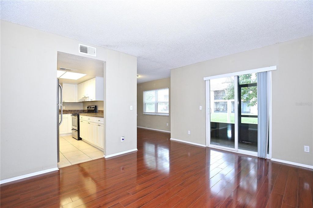 Photo of 9910 Turf Way #1, Orlando, FL 32837 (MLS # O6368548)