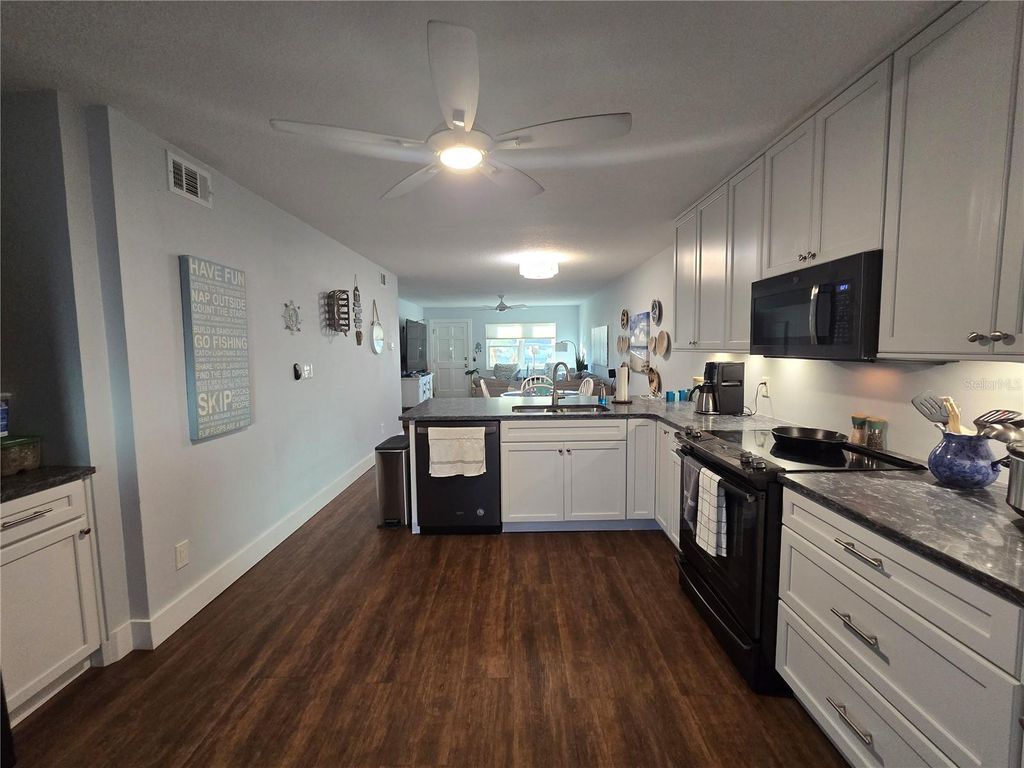 Photo of 211 Pasadena Avenue N #107, St Petersburg, FL 33710 (MLS # TB8437372)