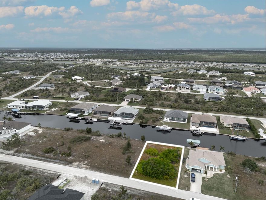 Gulf Access Homesite with Southern Exposure in Popular South Gulf Cove! just minutes from area beaches, golf courses, restaurants and shopping and much more. Experience the ultimate boater's paradise with this exceptional lot that opens up endless possibilities for aquatic adventures. Imagine waking up every morning to the gentle lapping of the waves and the freedom to set sail whenever you please. With boat water access and a seawall already in place, this lot is the perfect foundation for your dream home. Don't miss your chance to make your waterfront living dreams a reality.