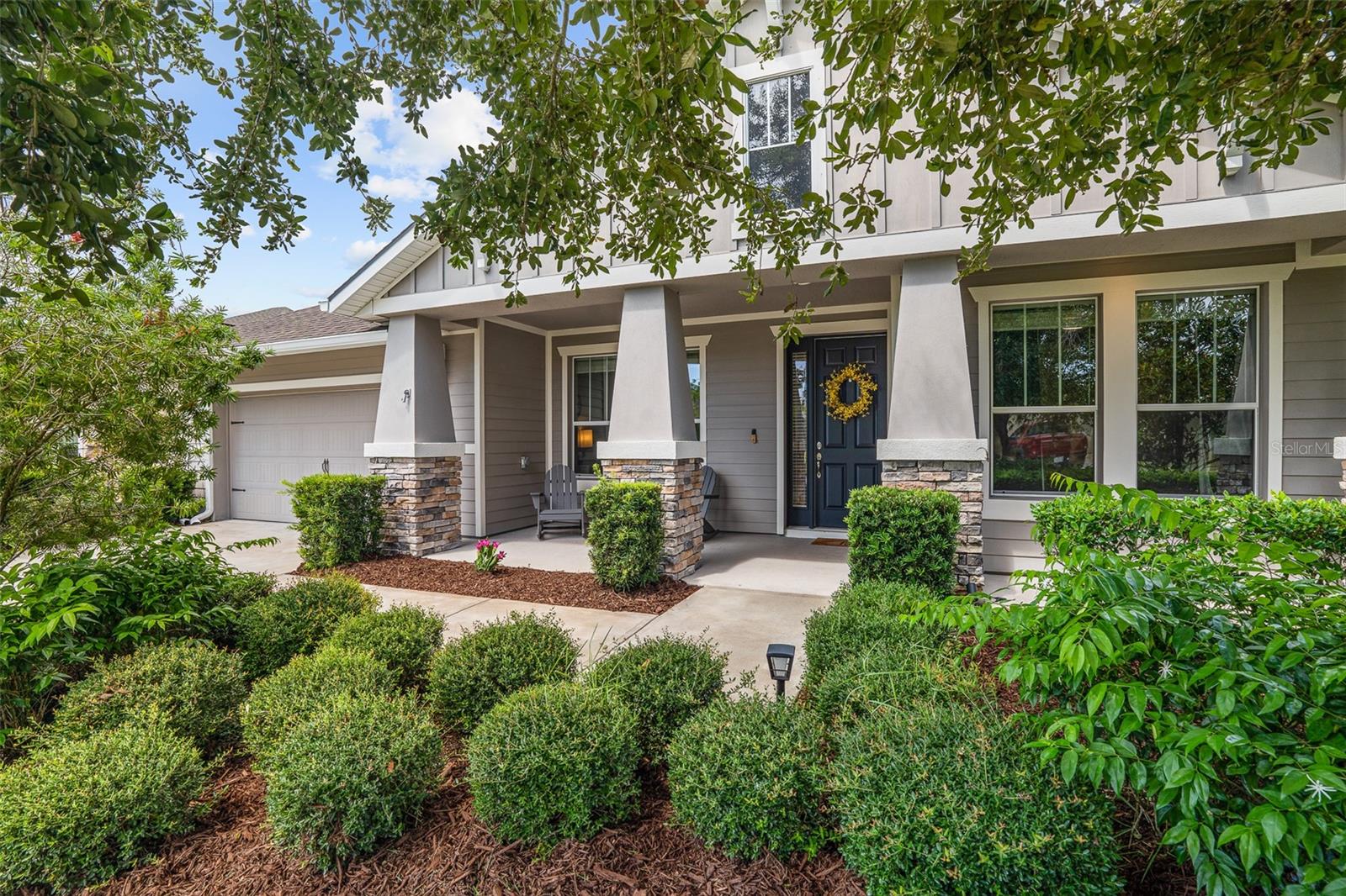 Immaculate Belaire Model with Private Preserve Views! Welcome to 613 Elk River Dr., a beautifully upgraded 4-bedroom, 2.5-bath pool home designed for both comfort and style. From the inviting covered front porch, step into a bright foyer with trey ceiling accents. Off the entry is your Flex Room. Space is great for playroom, office, or formal dining room-finished with tile plank flooring and large windows. The heart of the home is the expansive family room. Completed with tile plank floors, trey ceiling and 4 sliders out to lanai. Flows seamlessly into the completely RENOVATED gourmet kitchen—featuring striking two-tone cabinetry with soft close/all wood drawers, stainless steel appliances, a large center island with quartz, soap stone countertops and a walk-in pantry. The adjacent breakfast nook offers a cozy space for casual meals with tile plank flooring and views of pool. The private master suite is a true retreat with tranquil views of pool and preserve and oversized walk-in closet. En-suite Master Bath has double vanities, a walk-in shower, a soaking tub with lots of room. The split floor plan offers two spacious guest bedrooms sharing a full bath anchored at front of home. The 4th bedroom has double doors can serve as a home office or flex space. Additional 1/2 bath perfect for guest and use from the pool area. Enjoy indoor-outdoor living with sliding glass doors leading to a covered lanai and sparkling pool, all overlooking a peaceful preserve. HEATED POOL has water fountain feature and newer pool pump (2 years old). Beyond the pool is a great sized backyard fully fenced backing up to beautiful preserve. Home is completed with 3 car garage with 3rd car tandem and whole house water filtration system. Additional highlights include wood-look plank tile flooring throughout the main living areas, custom stop and drop area off garage entry, epoxy floors in garage, electric car charger, generator plug, ring doorbell, landscape lighting, shiplap wall accents, custom drapes throughout, plus much more! All located in GATED, golf cart friendly community of Plantation Bay. Country Club memberships to include 45 holes of golf, 9 tennis courts, 10 pickleball courts, new 30 million dollar Founders Clubhouse, fitness/spa center, 2 pools with cabana bar/grill, bocce ball, and full events calendar! Buyers of this home to receive a substantial discount on initiation fee at the club. Ask listing agent for details. This home is perfect for entertaining, relaxing, and enjoying Florida living at its finest!