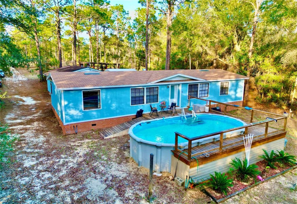 Photo of 109 Sandpiper Drive, Hawthorne, FL 32640 (MLS # GC536639)