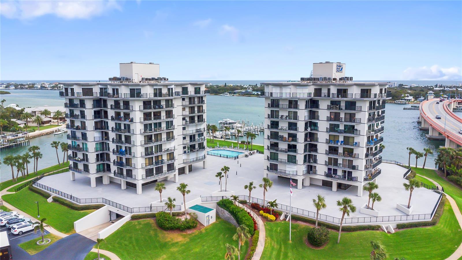 Waterfront luxury living at its finest! The Diamond Head community is one of the most impressive and well kept in New Smyrna. Fresh renovations include interior paint, ceiling finishes, new trim moldings and a remodeled guest bath! With a total of four balconies this condo gives you epic views of the waterway/marina as well as the beautiful Florida sunsets. Unit includes a spot in the gated underground parking garage. Bike and kayak storage are available in the garage as well. The community has a large fenced dog park, waterfront pool with deck area, multiple pickleball courts, fire pit, fitness center, on-site management, fishing pier, 35-slip marina and grilling stations all located on 5 acres of beautifully landscaped grounds. The recently renovated clubhouse is available for use by all residents of Diamond Head and may be reserved for private events! The building has had a complete exterior restoration within the last 5 years. Boat slips in the marina are owned by community residents and can be purchased or leased privately. Located within minutes of the beach and Flagler Ave shops! Golf carts are welcome! Schedule an appointment today!