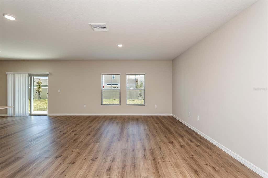 Photo of 9092 Belleview Forest Pass, Dade City, FL 33525 (MLS # TB8531945)