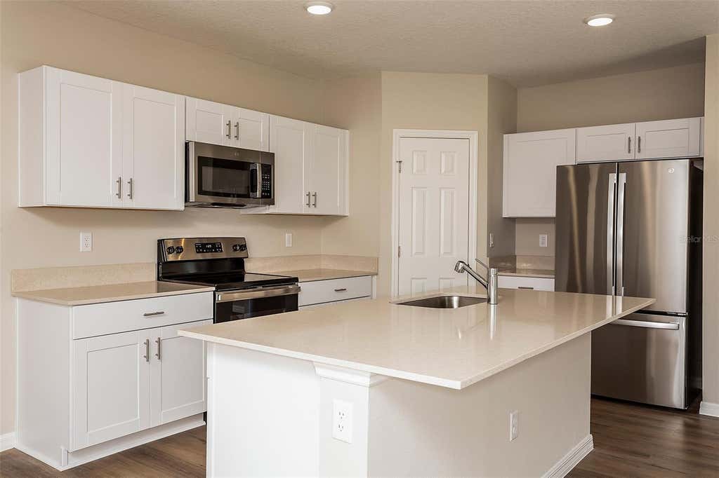 Photo of 9092 Belleview Forest Pass, Dade City, FL 33525 (MLS # TB8531945)