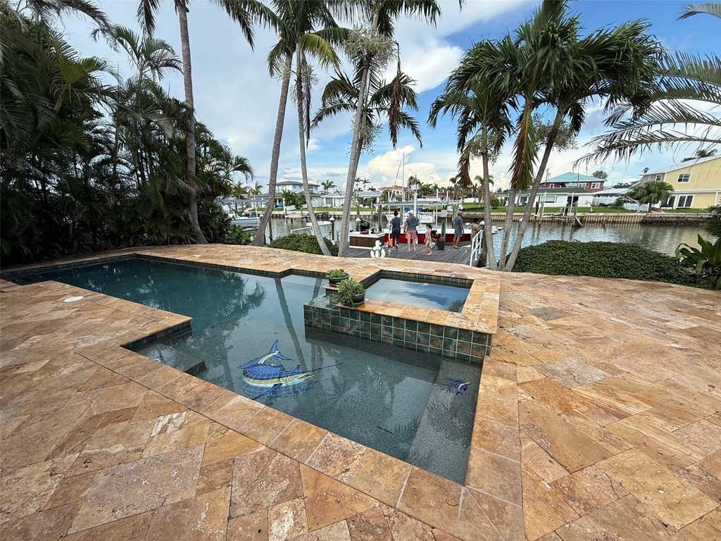 Photo of 639 Normandy Road, Madeira Beach, FL 33708 (MLS # TB8526905)