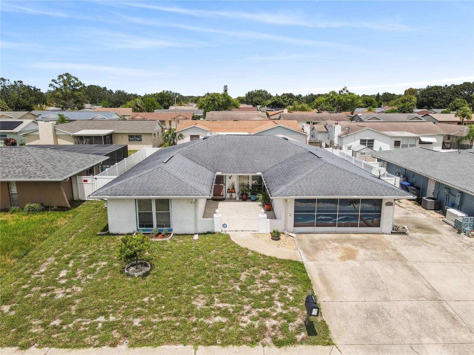 Step inside this charming 2-bedroom, 2-bathroom home with a bonus room and enjoy the comfort of a thoughtfully designed split floor plan. With no HOA, you’ll have the freedom to truly make this home your own.
A gated front porch welcomes you into a spacious living room that flows seamlessly into the dining and family rooms, creating an open and inviting layout. The family room offers easy access to the backyard, where you’ll find a covered patio, perfect for outdoor dining or relaxing in the shade.
The primary suite is privately tucked to the left side of the home, complete with an en suite bathroom and plenty of closet space. On the opposite side, the second bedroom is conveniently located next to a full bathroom. A versatile bonus room with backyard access provides endless possibilities for a home office, guest room, or playroom.
Additional highlights include an attached 2-car garage and a low-maintenance backyard with both comfort and function in mind.