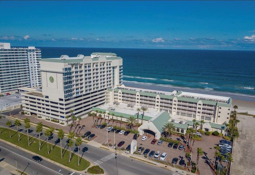 **GREAT INVESTMENT OPPORTUNITY**!! PET FRIENDLY BUILDING. BEAUTIFUL OCEAN VIEW CONDO! SHORT TERM RENTALS ALLOWED! Oceanfront Resort style living at its finest. Relax & Enjoy stunning ocean, river and city views from this 11th floor, NE unit. Fully furnished unit with step out balcony PRIVATE (room for two small stools and small table), 2 queen beds, larger ''accessible'' bathroom. Kitchen includes, cooktop, microwave, Keurig coffee maker and refrigerator. This Amazing Resort includes 2 large pools over looking the Atlantic Ocean and 1 wading pool with 2  waterfall features for fun in the sun. Other amenities include an indoor heated pool, two indoor hot tubs, sauna, outside tiki bar, restaurant w/bar, fitness center, fire pit and a new arcade. Walk to shopping, & restaurants. ;LocationDescription: Condo ;Water: City