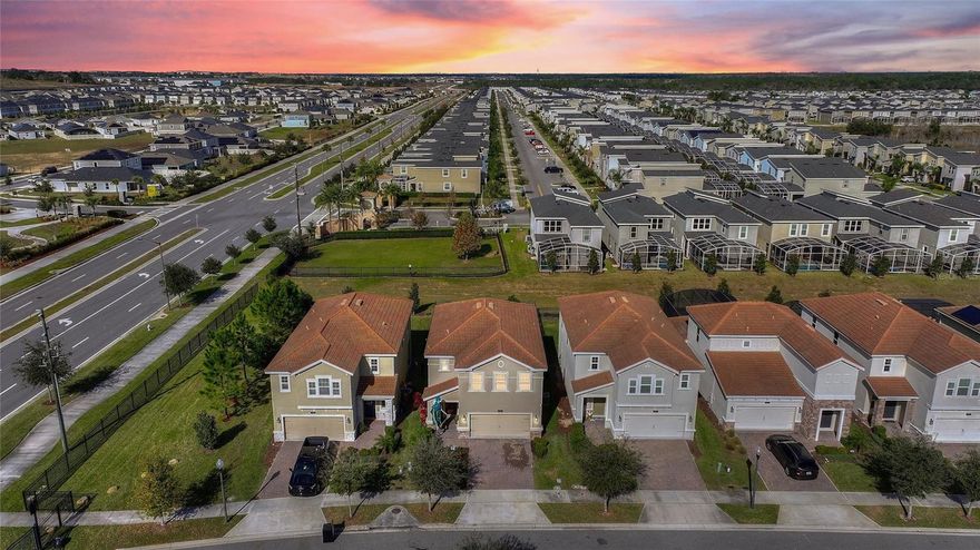 FHA ASSUMABLE MORTGAGE at an exceptional 3.5% interest rate! Welcome home to the exclusive, guard gated ChampionsGate Country Club, where resort living meets everyday comfort. This beautifully maintained 3-bedroom, 2.5-bath residence sits on one of the community’s most desirable lots, offering no rear neighbors, lush private landscaping, and a spacious covered lanai overlooking a large, private backyard with ample room to add a full-size pool while still maintaining generous outdoor space perfect for creating your own personal Florida oasis. Inside, you’ll find a bright, open concept first floor designed for both entertaining and everyday living. The home has been fully updated with premium flooring throughout, featuring wood plank style tile across the entire first floor and upstairs living areas, complemented by high end plush carpeting on the staircase for comfort and safety. Additional highlights include upgraded fixtures, quartz countertops in the kitchen and baths, 42-inch solid wood cabinetry, faux wood blinds, a smart irrigation system, and a classic barrel tile roof. The luxury designer kitchen is both stylish and functional, showcasing stainless steel appliances, including an upgraded LG smart refrigerator and LG smart dishwasher, offering modern convenience and sleek design. Natural light fills the home while tinted windows in the primary bedroom and both secondary bedrooms help reduce heat and enhance year-round comfort. Upstairs, the home offers exceptional versatility with a spacious flex space ideal for a home office, gaming or media room, second family room, or easily converted to a fourth bedroom if desired. Comfort is enhanced with upgraded ceiling fans throughout the entire upstairs. The expansive primary suite spans the full width of the home, creating a truly impressive retreat. This oversized sanctuary features dual vanities, a walk-in shower, a separate soaking garden tub, and an exceptionally large walk-in closet, offering both luxury and functionality rarely found at this price point. The upstairs laundry room includes a brand-new Samsung smart steam washer and dryer, included with the sale. The garage is thoughtfully equipped with storage racks and a second refrigerator, keeping the space organized and highly functional. Living here means enjoying luxury resort-style amenities that few communities can match. HOA dues include full golf and tennis memberships, a $75 monthly dining credit, high-speed internet, cable, phone service, complete lawn care, and 24-hour security monitoring. Residents enjoy exclusive access to three world-class amenity centers, including the Oasis Club, Plaza Clubhouse, and Retreat Club. Move effortlessly through the community in your premium Bintelli Beyond 4 golf cart, included with the home, while enjoying your full golf membership already covered by HOA fees. Trash pickup and CDD fees are conveniently included in the annual property taxes. No short-term rentals permitted. Ideally located just minutes from Walt Disney World, Posner Park, Margaritaville, major airports, shopping, dining, entertainment, medical facilities, and more, this home offers an unbeatable combination of lifestyle, location, and value. Schedule your private showing today as homes in this highly desirable community do not last long!