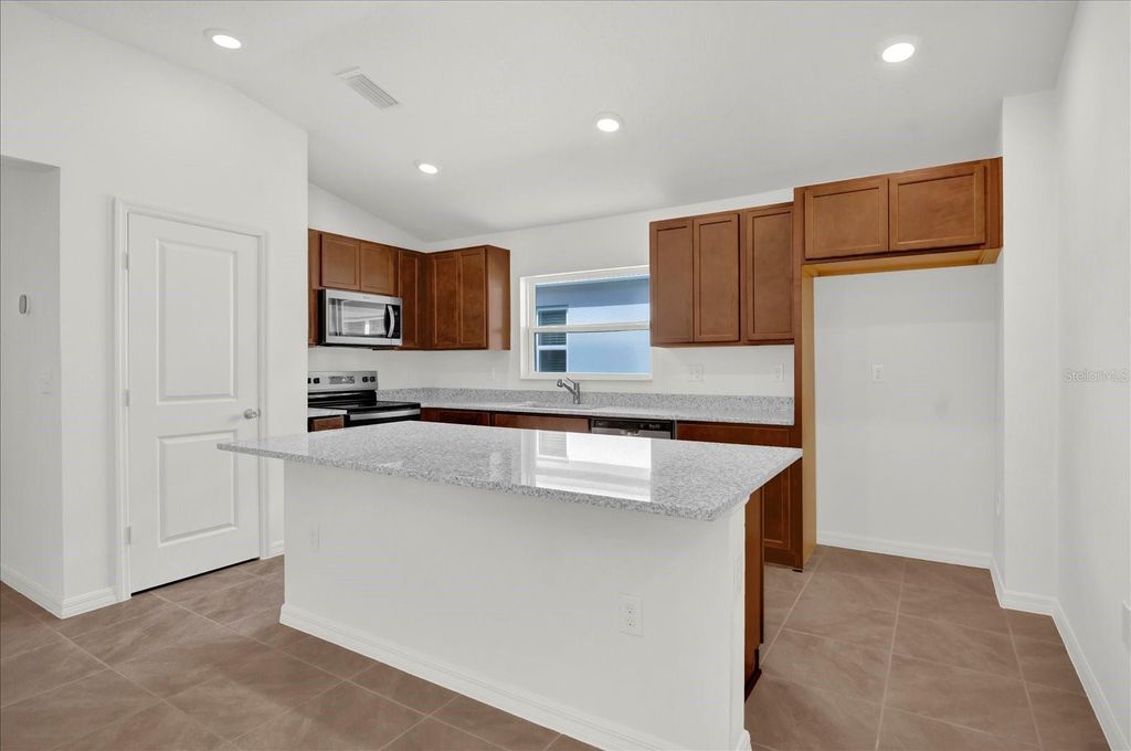 Photo of 8633 Caribbean Pine Way, Lakeland, FL 33809 (MLS # O6363863)