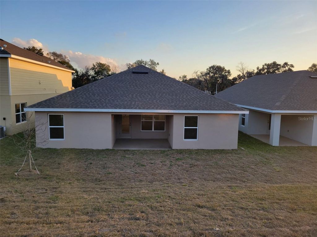 Photo of 1623 Ann Rose Way, Leesburg, FL 34748 (MLS # O6377542)