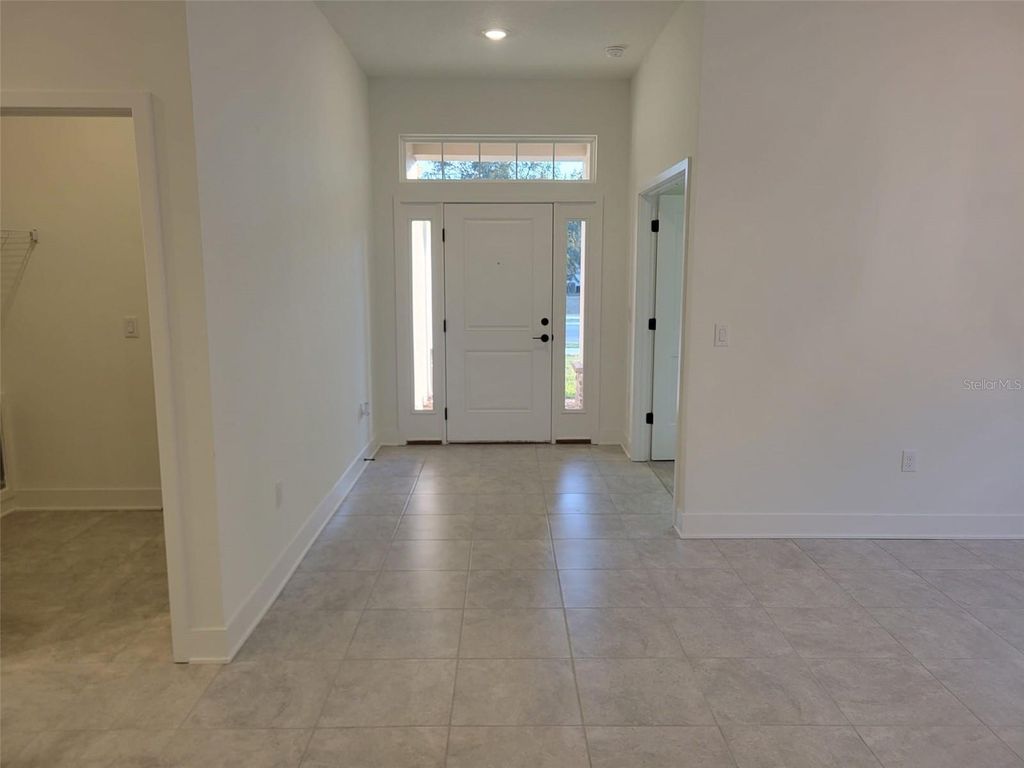 Photo of 1623 Ann Rose Way, Leesburg, FL 34748 (MLS # O6377542)