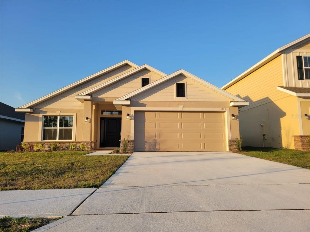 Photo of 1623 Ann Rose Way, Leesburg, FL 34748 (MLS # O6377542)