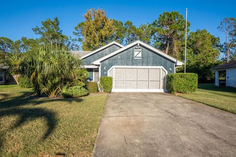 Photo of 22 Whispering Pine Drive, Palm Coast, FL 32164 (MLS # FC314064)