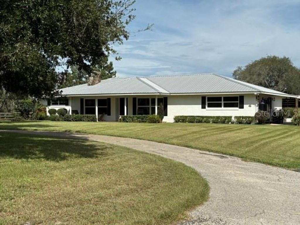 Photo of 503 Bear Rd, Lake Placid, FL 33852 (MLS # C7514339)