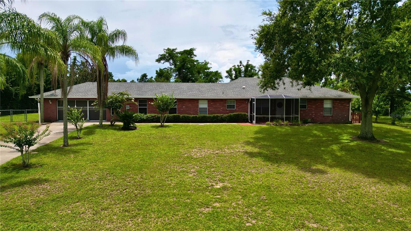 Hear the soothing carillon bells from Bok Tower. This home sits at one of the highest elevations in Central Florida. This charming 3-bedroom, 3-bath home featuring a handicap accessible and private mother-in-law suite also ideal for guests or generating rental income. Enjoy peaceful mornings on the spacious screened-in back porch. Just minutes from the Eagle Ridge Mall and only 20 mins from LEGOLAND. Disney and Epcot are approximately 45 minutes away. The backyard offers exceptional privacy and backs up to the prestigious Mountain Lake Estates, adding to the serene setting. Tucked away in a quiet subdivision with no HOA, this property blends comfort, flexibility, and investment potential in one package.