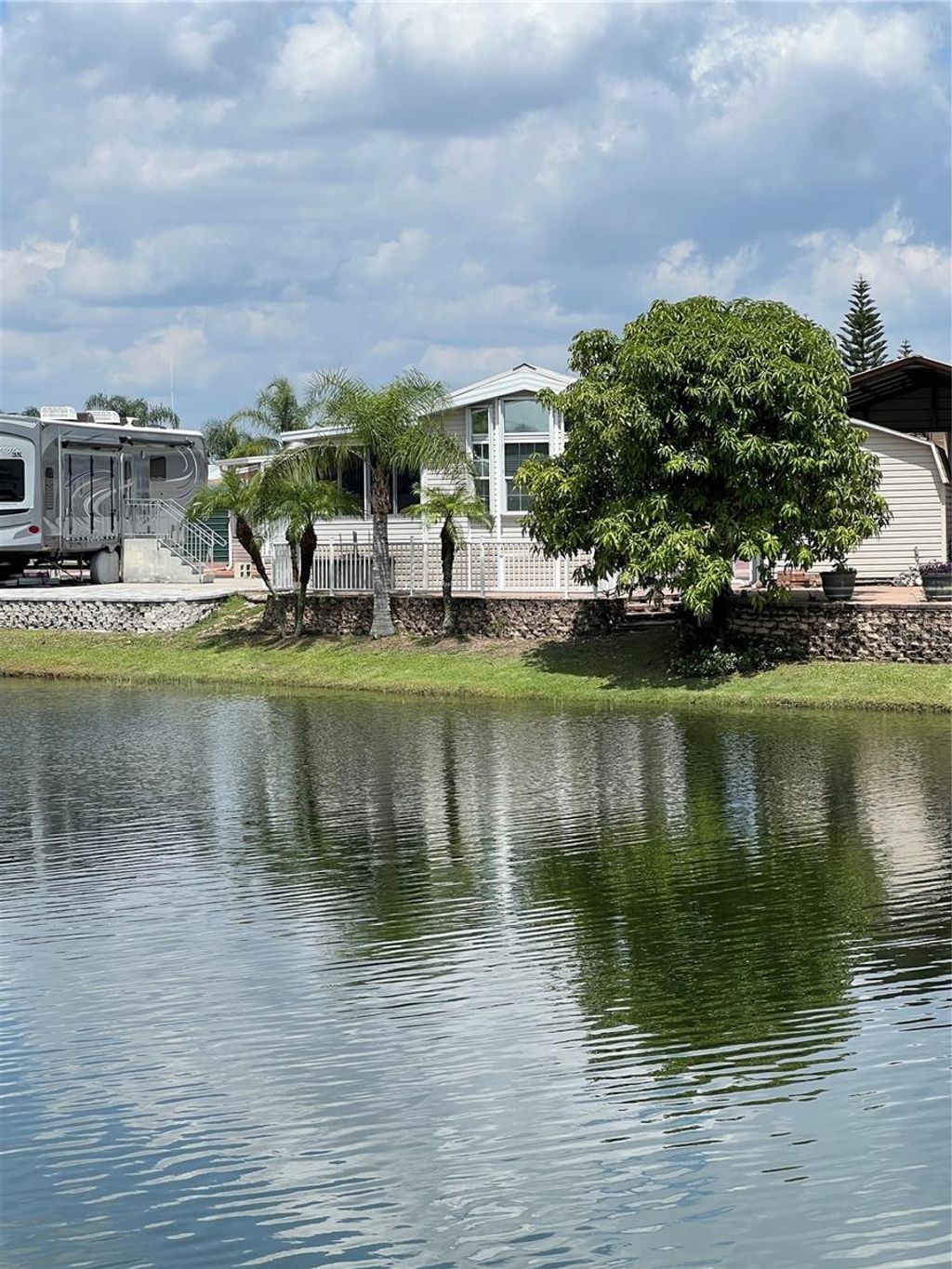 Photo of 7950 State Road 78 W #290, Okeechobee, FL 34974 (MLS # OK225387)