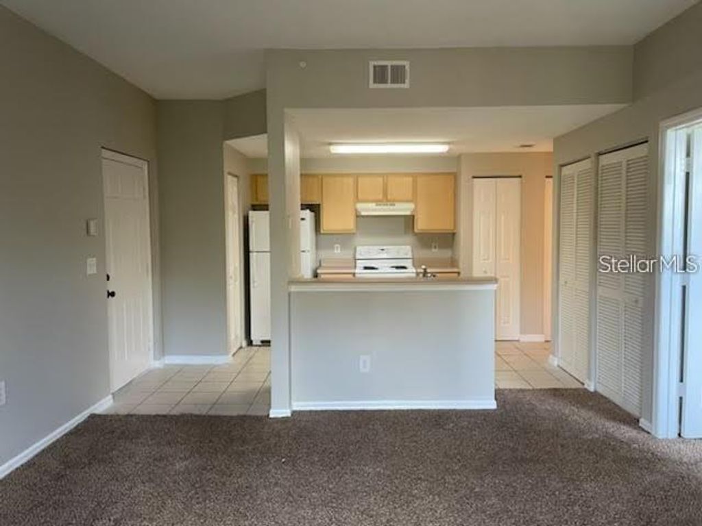 Photo of 10831 Windsor Walk Drive #1302, Orlando, FL 32837 (MLS # O6392909)