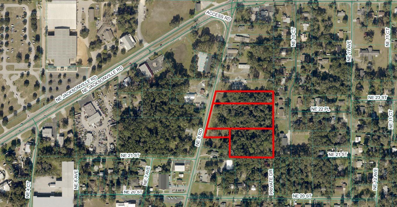 5.98 Acres, zoned B-4. 378' of frontage on NE 8th Road. City sewer manhole on site, city water available. Survey available in listing office. Flood zone X & AE.