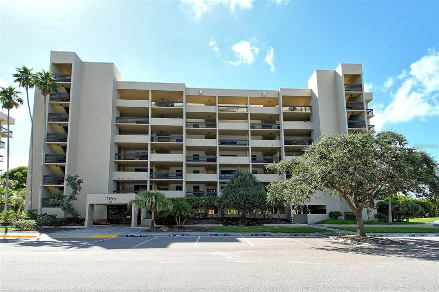 Presenting a stunning penthouse unit now available for lease!
This top-floor, corner residence offers magnificent, panoramic views of the Gulf of Mexico, the Longboat Key Club golf course, and the Intracoastal Waterway. Upon entering, you are welcomed by abundant natural light pouring in through floor-to-ceiling sliding glass doors, which are equipped with electric roller shades. The unit also features a large, wraparound balcony, perfect for entertaining family and friends.

The primary bedroom includes electric roller shades for convenience. The primary bathroom is elevated with double vanities, updated lighting fixtures, a quartz countertop, and a walk-in shower. The updated guest bathroom features a quartz counter, a shower/bathtub combination, and provides access to the guest bedroom. A private parking space under the building is also included.

The building is ideally located near the clubhouse, which offers exceptional amenities including a junior Olympic-size pool, spa, kiddie pool, fitness area, saunas, grilling area, and a variety of social activities and shaded areas.

The community further enhances your lifestyle with private beach access, complete with beach chairs and umbrellas, Pickleball and tennis courts, EV charging stations, and dedicated bike storage. This location provides easy access to St. Armand's Circle shopping, restaurants, and everything Sarasota has to offer.