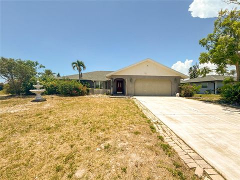 Photo of 132 Mark Twain Lane, Rotonda West, FL 33947 (MLS # TB8521935)