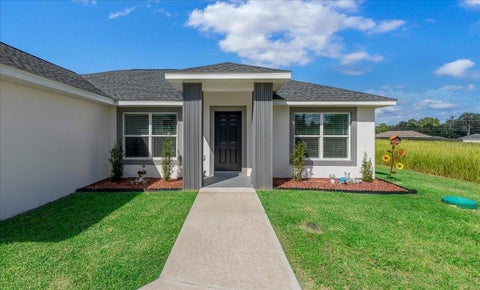 Photo of 55 Locust Loop Circle, Ocala, FL 34472 (MLS # OM734011)