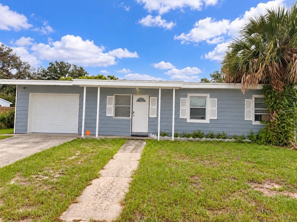 Photo of 1387 Stillwater Avenue, Deltona, FL 32725 (MLS # O6452800)