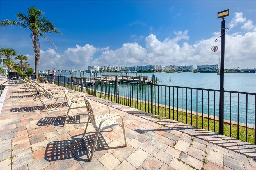 Wake up to stunning bay views and spend your days just steps from the sugary sand of St. Pete beach in this perfectly located 1-bedroom, 1-bath getaway. Small in size but huge on charm, this cozy retreat offers a waterfront pool overlooking the bay, unbeatable scenery, and the kind of location often dreamt about. Completely remodeled after the hurricanes, the unit has been beautifully updated and is move-in ready. The St. Pete beach recreation center next door add to the convenience and entertainment. Whether you're lounging poolside, walking across to the beach, or taking in the peaceful water views, this spot delivers the ultimate beach lifestyle without the big price tag. Affordable, adorable, and impossible to beat for the money.