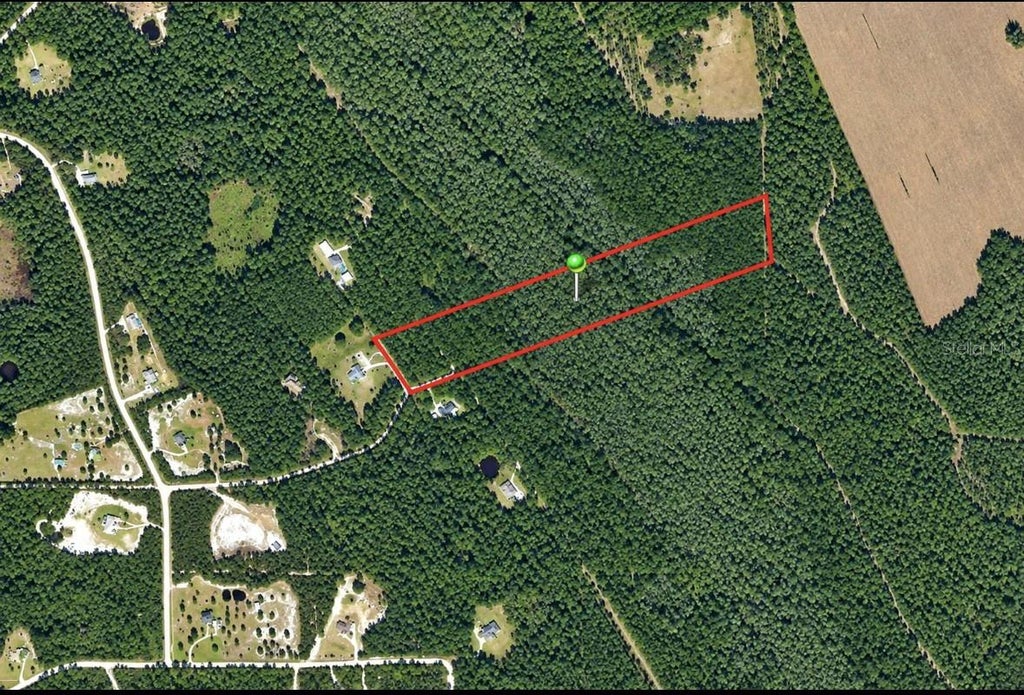Photo of 1930 Old Train Road, Deltona, FL 32738 (MLS # O6447781)