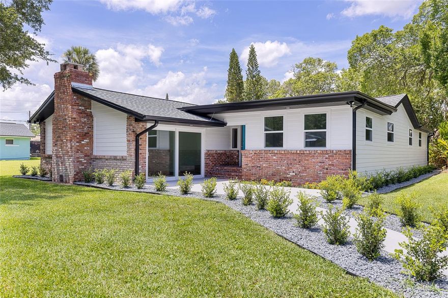 Charming 1950s bungalow with modern flair on over half an acre! Step into timeless character blended seamlessly with modern sophistication in this completely remodeled 1950s bungalow. On an expansive half-acre plus lot, this picture-perfect home offers the space, style and convenience you've been looking for—just minutes from world-famous beaches and the pickleball paradise of Pictona. Every inch of this home has been thoughtfully updated, featuring new roof, windows, electrical, and plumbing. luxury vinyl plank flooring throughout. Custom kitchen cabinets and solid surface countertops. New high-end appliances. Fully renovated baths with modern finishes. Two cozy wood-burning fireplaces. Enjoy the Florida lifestyle with a refreshing outdoor shower, lush new landscaping supported by a new irrigation system, and plenty of room to entertain or unwind. The oversized lot has ample space to build a dream pool, garden oasis or host large gatherings under the stars. A detached two-car garage sits at the rear of the property, which includes a half bath—ideal for extra storage, a workshop or a future guest suite.

Don’t miss this rare blend of vintage charm and contemporary upgrades in a prime location near shopping, dining, recreation and everything the coast has to offer. Your modern bungalow dream starts here.