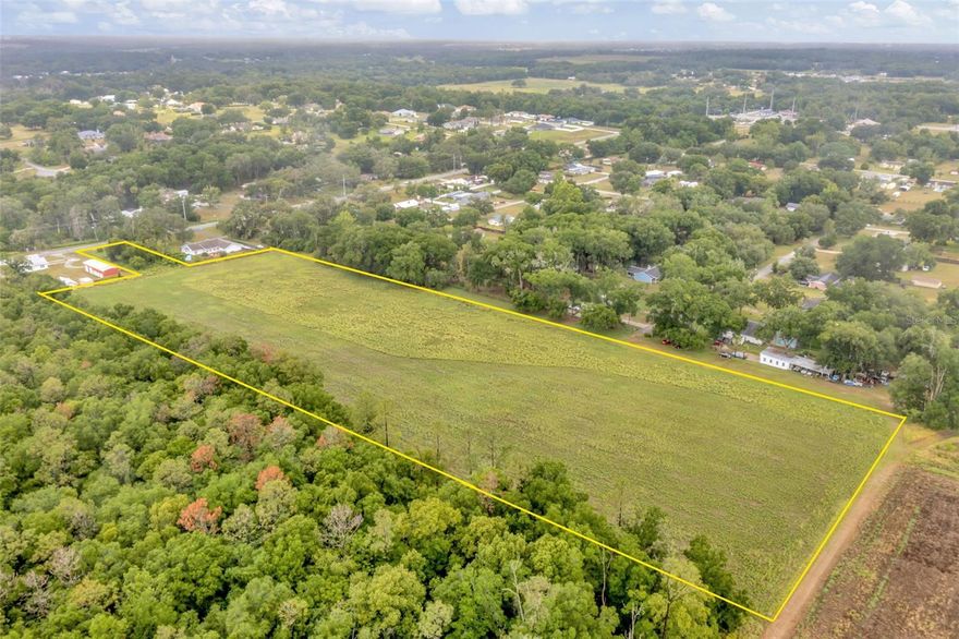 This is an opportunity to own a beautiful, high and dry 10.31-acre parcel in the rapidly developing area of Dade City with no HOA or deed restrictions. The property has the potential to build up to 8 homes, as it is zoned Residential Estate (E-R), a designation previously approved by Pasco County. Located in Pasadena Hill, the property is part of a master plan to add a four-lane road, a school, a park, and a business center. It is also situated next to Mirada Lagoon, one of the nation's largest lagoons, spanning 15 stunning acres. The property is approximately 0.25 mile from SR 52, providing easy access to I-75 and US 301 within minutes. Downtown, medical centers, Publix, and shopping centers are all within 3 miles. When you visit the site, you will appreciate the beautiful neighborhood properties along Fort King Road, the two road frontages, and the fantastic hillside views. Call today for more information, including the site plan and survey.