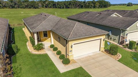 Photo of 9657 SW 63rd Loop, Ocala, FL 34481 (MLS # OM713336)