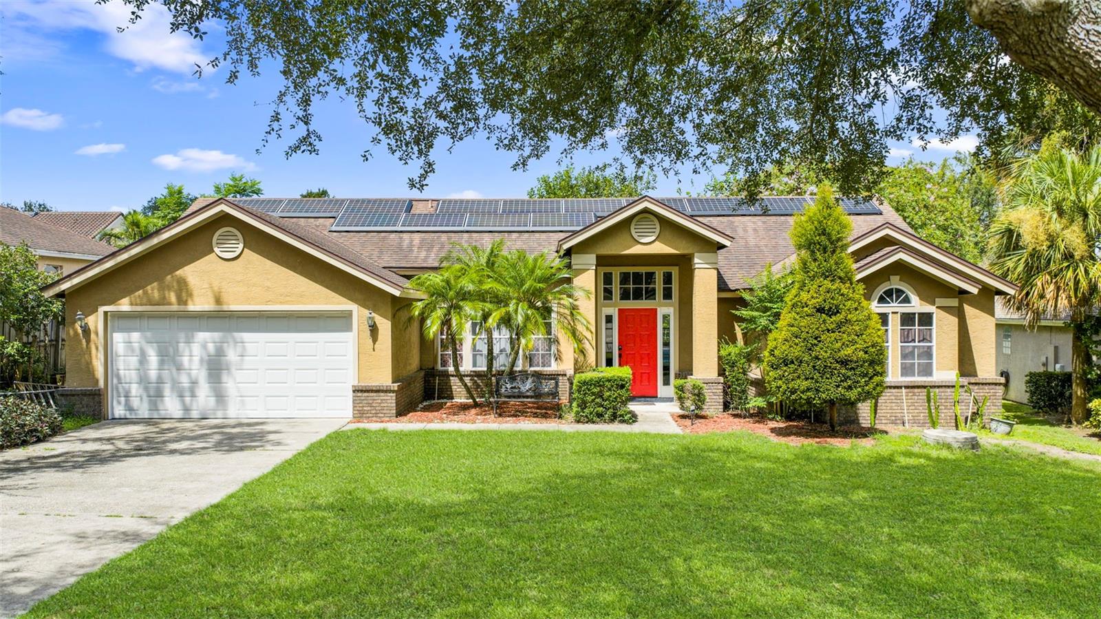 **POOL HOME** SOLAR PANELS PAID OFF** **MOTHER IN LAW SUITE** Easy Owner Financing Available at 4.99% with $70K down** Welcome to this inviting 4-bedroom, 3-bathroom pool home in the desirable MetroWest community of Orlando. Designed with both comfort and practicality in mind, this residence offers a split-bedroom layout that perfectly balances privacy and open living, making it ideal for families, multi-generational living, or those who love to entertain.
Step inside through the vibrant front entry and you’ll immediately notice the soaring ceilings and natural light that fill the home. The spacious formal living and dining areas provide a warm welcome, with French doors framing views of the screened pool and patio beyond. To one side of the home, the expansive primary suite offers a private retreat, complete with pool access, a walk-in closet, and a spa-inspired bathroom featuring dual vanities, a soaking tub, and a walk-in shower.
On the opposite wing of the home, two secondary bedrooms share a full bath, while a separate guest suite with its own bathroom and direct access to the pool serves as a perfect mother-in-law suite or private space for visitors. At the heart of the home, the kitchen offers plenty of cabinetry, stainless steel appliances, and a breakfast bar that overlooks the family room. This central gathering space is anchored by a cozy brick fireplace and opens seamlessly to the pool deck, creating the perfect hub for everyday living and entertaining.
Additional conveniences include an indoor laundry room with easy garage access, multiple storage options, and tile and wood-like flooring throughout. Outdoors, the screened lanai and sparkling pool with spa provide the ultimate Florida lifestyle setting—ideal for weekend barbecues, relaxing evenings, or year-round fun in the sun. The property also features paid-off solar panels, offering both energy efficiency and long-term savings.
Blending functional design with inviting living spaces, this home has everything you need—spacious interiors, private bedroom retreats, and outdoor amenities—all in a prime Orlando location near schools, shopping, dining, and major highways.