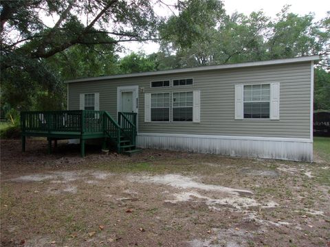Photo of 8518 NE 154th Avenue, Silver Springs, FL 34488 (MLS # OM666282)