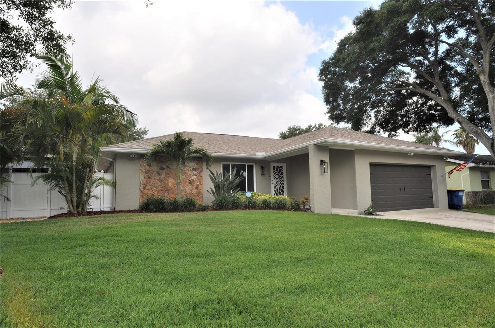 Look no further, your dream home is right here in the heart of Countryside! Tons of upgrades throughout. Totally upgraded kitchen and baths including jetted tub; all new flooring throughout with upgraded baseboards; all new exterior impact windows and doors (2021); new blinds throughout; newer screen enclosed, paver enhanced lanai with in-ground saltwater pool with LED lighting (2016); freshly landscaped, totally private, corner, fenced lot with irrigation system with new well (2022); Brand new Pavilion for additional outdoor living, entertaining and/or grilling pleasure. Plenty of natural light enhanced in kitchen with recently installed solar tube. Other upgrades worth noting but not limited to: Newer garage doors; LED recessed lighting in living room, exterior painted (2021); water heater (2021); garage door opener (2021); Water conditioner (2022) the list goes on. This home is immaculate, meticulously maintained and lovingly cared for, you’ll just have to see it to appreciate it. All dates and measurements are approximate and should be verified by buyer.