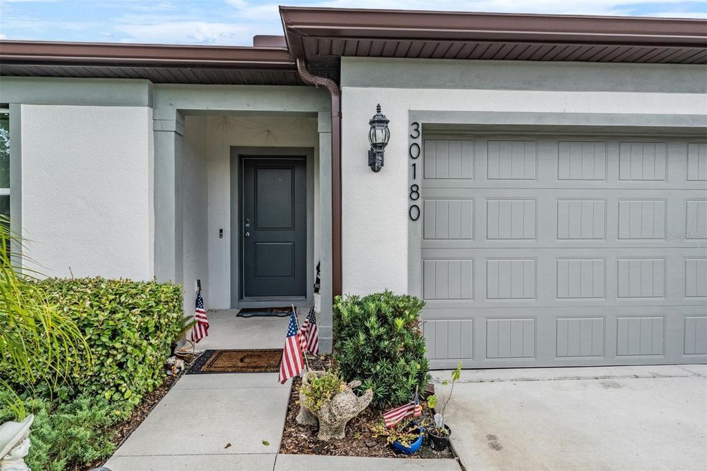 Photo of 30180 Skylark Drive, Wesley Chapel, FL 33545 (MLS # TB8404364)