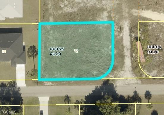 Photo of 1605 E 7th Street, Lehigh Acres, FL 33972 (MLS # TB8556444)