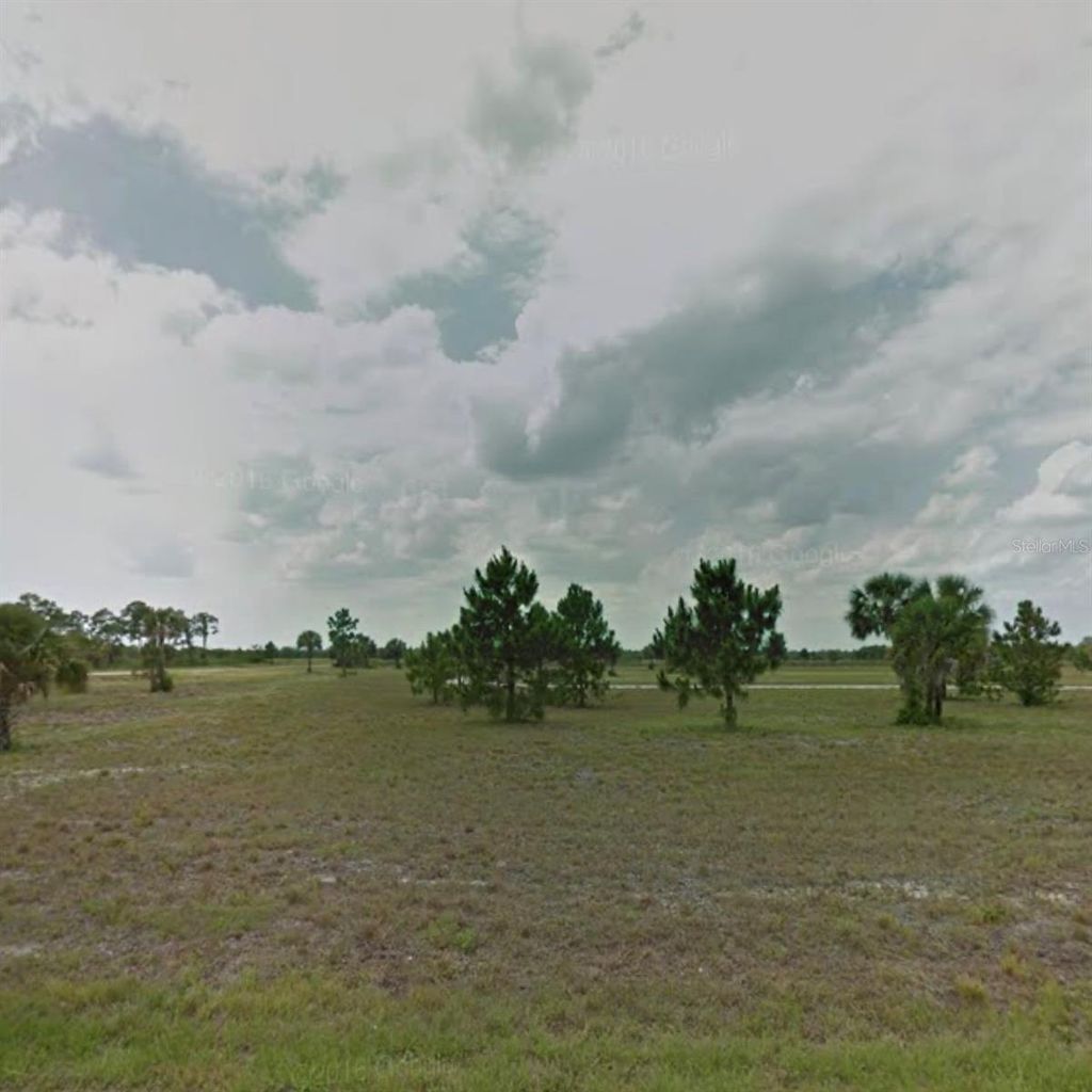 Photo of 12295 Quail Drive, Placida, FL 33946 (MLS # C7487449)