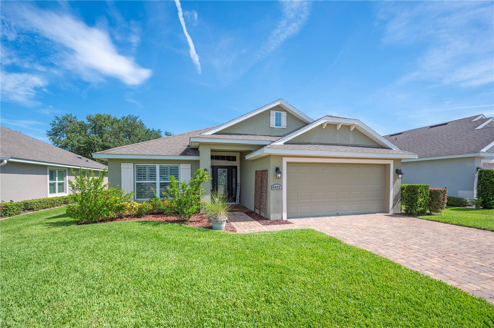 Welcome to Morgan Creek Preserve, No CDD!
This well cared for home is located in the Village section of this established, south Lakeland gated community. As you enter, the spacious foyer has ceramic tile & a lovely chandelier to greet you. Enough room for a console table, perfect for fresh flowers. Just to the left there are double doors into the flex room that is perfectly suited for an office, studio or 4th bedroom. Built in window shutters and a generous closet complete the space. Open floor plan boasts a separate dining area just across from the spacious kitchen. An abundance of shaker style white cabinetry, hi-definition Wilsonart laminate countertops and stainless steel appliances for all your home cooks! There is ample room for a table and seating, kitchen island, more cabinetry, whatever strikes your fancy. The closet pantry is ready to hold all the extras. Primary bedroom lets in all the light from the windows that are adorned with floor to ceiling drapes and the warm paint color makes it extra cozy! Fall in love with the custom closet that has room for all the bags and shoes! En-suite bath is complete with higher vanity double sinks, garden tub and separate shower. Two bedrooms are across the living space, both with generously sized closets & vaulted ceilings. Full hall bath in between, has an easy to clean tub/shower combo and there is a hall linen closet. Laundry room is conveniently located off the kitchen as a pass through to the garage, there is custom cabinets to hold all the cleaning supplies and will fit the large front loader appliances. Pavered and covered back patio to enjoy morning coffee overlooking the fenced green space, and room for the grill, current owner extended the pavers for more room. Garage has an automatic opener as well as attic stairs for ease of storage. Community amenities include the most welcoming zero entry pool, tennis courts for those sunrise matches, a basketball court and a play area, for everyones enjoyment. Home exterior has been freshly painted. Beautiful ponds and sidewalks throughout the whole community, perfect for dog walking or swan spotting. Two former Lake Morton feathered residents have even moved to Morgan Creek, you should too! Make your appointment to tour this great home, perfect for starting out or sizing down, it’s a great place to call Home!
