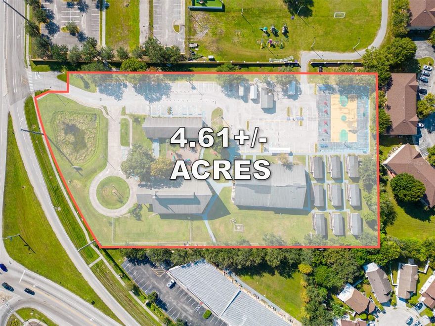 This property located in Kissimmee, Florida offers an excellent opportunity where you can grow and meet the needs of the community as a Place of Worship, School or/and Community Outreach Center. The property features 200,812 sq ft on 4.61 acres fully fenced with 4 buildings, 2 large storage/maintenance units and 9 portables with access to a playground and an outside basketball court. Main Building has a spacious area in process of remodeling with the plans of a gymnasium/sanctuary which will have pullout bleachers for Sunday Service, Conferences, Games and Concerts. Building 2 you will find a Cafeteria/Gym and Kitchen lots of space for future use as classrooms or offices. Building 3 is currently a Medical Clinic for the community's needs. When ready site plans have been approved to build a two-story structure with infrastructure in place for a potential sanctuary, school or income producing property with an abundance of parking space and endless possibilities for growth and development. Overall property location is on a busy roadway in great location waiting for a buyer with a vision to expand providing multiply needs for a growing community.