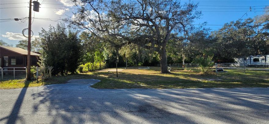 Under contract-accepting backup offers. The location is fantastic, Zoned for Single-Family Residence/Mobile Home - or hold on to as an investment. Property has an existing septic system and well; the trailer that was previously on the site has been removed. Not in a deed restricted community, NO HOA or CDD fees either. Close to all area amenities such as shopping, schools, dining, entertainment, medical, saltwater fishing in the Gulf  - for those who love the outdoors. Come see this beautiful home site today before it's gone.