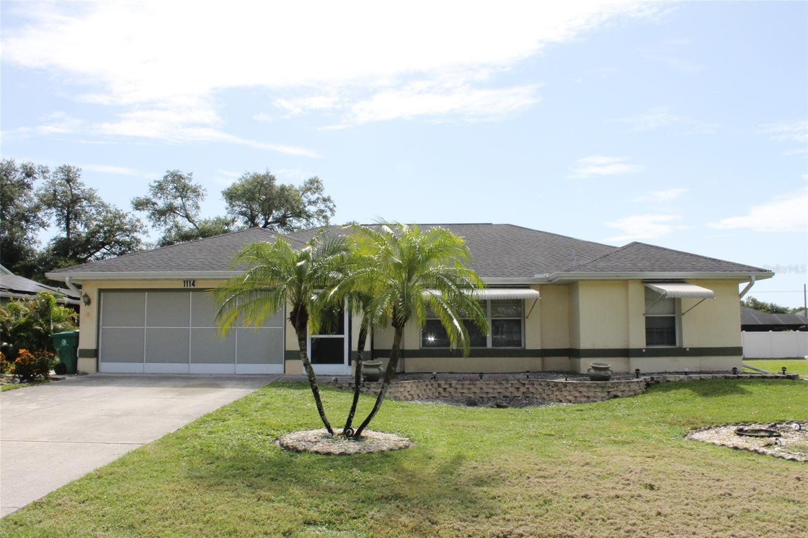 Welcome to your new home in the heart of Port Charlotte! This charming single-family residence features 3
spacious bedrooms and 2 bathrooms, perfectly designed for comfortable living. Covering 1,767 square feet,
this home offers a well-maintained front yard adorned with tropical palm trees, an inviting covered
entryway, and a spacious driveway leading to an attached garage. The layout is single-story, providing
easy accessibility throughout the home. This property comes equipped with essential amenities, including
a washer and dryer for your convenience. Enjoy the benefits of central heating and cooling along with
ceiling fans for added comfort. While utilities such as cable, internet, and water are not included, yard
maintenance is covered, allowing you to relax and enjoy your outdoor space. Located just minutes from HCA
Florida Fawcett Hospital.