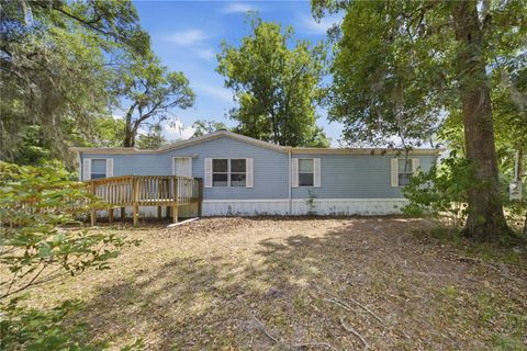Photo of 3290 NE 161st Street, Citra, FL 32113 (MLS # OM723778)