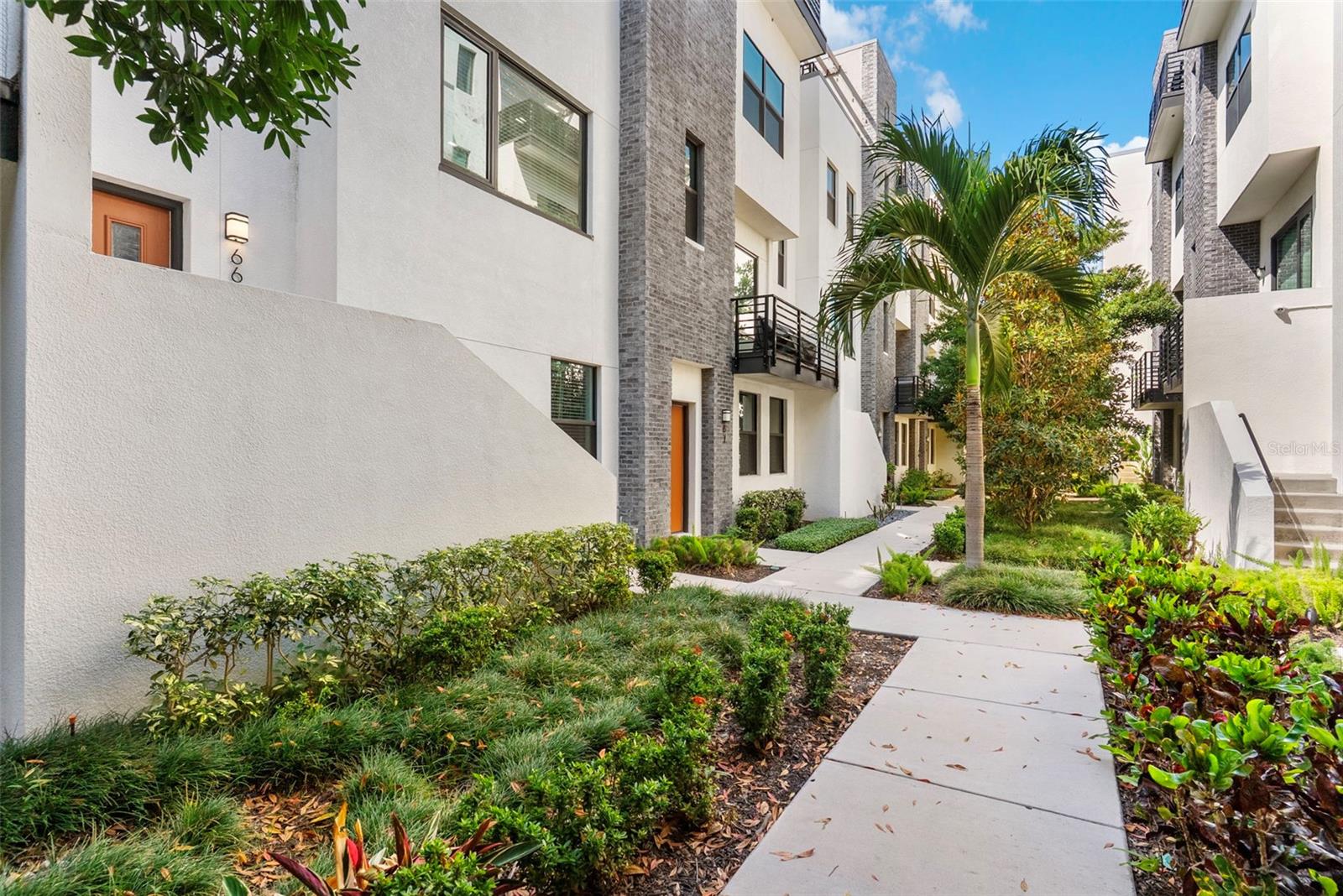 Experience luxury living in the heart of Tampa, just steps away from the renowned International Plaza. This stunning 3-story townhome offers modern elegance, unparalleled convenience, and an ideal location for those who want to live in the center of all the excitement the city has to offer. With over 1,800 square feet of beautifully designed living space, this home boasts a highly desirable combination of stylish finishes, high-end amenities, and a layout perfect for both relaxation and entertaining. The community features fantastic amenities, including a resort-style pool with a cabana, an outdoor kitchen, and a fire pit, providing a perfect space to unwind or host gatherings. Inside the home, you’ll find a bright, open-concept floor plan with large windows that flood the space with natural light. The kitchen is a chef’s dream, featuring modern cabinetry, sleek drop-down lighting, a KitchenAid gas range with a hood, built-in microwave, and a double-door refrigerator, perfect for preparing gourmet meals. The adjacent formal dining room provides ample space for elegant dinners, while the breakfast bar offers a more casual dining option for everyday meals. The primary bedroom is generously sized, with recessed can lighting that enhances the tranquil atmosphere, creating a serene space for rest and relaxation. The primary bathroom features undermount sinks and a spacious walk-in shower, adding to the home’s modern appeal. The secondary bedrooms are equally impressive, offering plenty of closet space and bright light, making them ideal for family members or guests. A convenient powder bath on the second floor adds to the home's functionality, while the third floor offers an expansive rooftop terrace, perfect for enjoying Tampa's beautiful weather. Whether you’re hosting a rooftop gathering, relaxing in the sun, or enjoying the stunning city views, this private outdoor space is a standout feature of the home. The home also includes a spacious two-car garage, offering secure parking and extra storage space. Located in one of Tampa’s most desirable neighborhoods, this home is just across the street from International Plaza, where you can shop at high-end retailers like Nordstrom and Saks Fifth Avenue, or enjoy exceptional dining at top-rated restaurants. From the nearby Westshore Plaza to the cultural and entertainment venues in downtown Tampa, everything you need is within easy reach. For beer enthusiasts, there are several highly regarded breweries like Cigar City Brewing, offering a wide selection of craft brews. If you enjoy dining out, you’ll love being near Bern’s Steak House, known for its world-class steaks and extensive wine list, or Mise en Place, an upscale restaurant offering contemporary American cuisine. The home is also just minutes from the Tampa Riverwalk, where you can enjoy scenic views, waterfront parks, and a variety of outdoor activities. Additionally, you’ll find an abundance of entertainment venues, including Franklin Manor, a lively spot with outdoor seating and live music, and The Capital Grille, a refined steakhouse with a welcoming ambiance. For those who love shopping, you’ll have easy access to the latest trends and luxury brands at nearby retail centers. Beyond its prime location for shopping and dining, this home is also ideally situated for quick access to major highways like I-275, making commuting a breeze. The Tampa International Airport is just a short drive away, for frequent flyers.