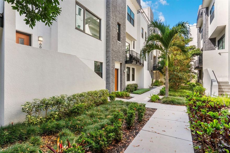 Experience luxury living in the heart of Tampa, just steps away from the renowned International Plaza. This stunning 3-story townhome offers modern elegance, unparalleled convenience, and an ideal location for those who want to live in the center of all the excitement the city has to offer. With over 1,800 square feet of beautifully designed living space, this home boasts a highly desirable combination of stylish finishes, high-end amenities, and a layout perfect for both relaxation and entertaining. The community features fantastic amenities, including a resort-style pool with a cabana, an outdoor kitchen, and a fire pit, providing a perfect space to unwind or host gatherings. Inside the home, you’ll find a bright, open-concept floor plan with large windows that flood the space with natural light. The kitchen is a chef’s dream, featuring modern cabinetry, sleek drop-down lighting, a KitchenAid gas range with a hood, built-in microwave, and a double-door refrigerator, perfect for preparing gourmet meals. The adjacent formal dining room provides ample space for elegant dinners, while the breakfast bar offers a more casual dining option for everyday meals. The primary bedroom is generously sized, with recessed can lighting that enhances the tranquil atmosphere, creating a serene space for rest and relaxation. The primary bathroom features undermount sinks and a spacious walk-in shower, adding to the home’s modern appeal. The secondary bedrooms are equally impressive, offering plenty of closet space and bright light, making them ideal for family members or guests. A convenient powder bath on the second floor adds to the home's functionality, while the third floor offers an expansive rooftop terrace, perfect for enjoying Tampa's beautiful weather. Whether you’re hosting a rooftop gathering, relaxing in the sun, or enjoying the stunning city views, this private outdoor space is a standout feature of the home. The home also includes a spacious two-car garage, offering secure parking and extra storage space. Located in one of Tampa’s most desirable neighborhoods, this home is just across the street from International Plaza, where you can shop at high-end retailers like Nordstrom and Saks Fifth Avenue, or enjoy exceptional dining at top-rated restaurants. From the nearby Westshore Plaza to the cultural and entertainment venues in downtown Tampa, everything you need is within easy reach. For beer enthusiasts, there are several highly regarded breweries like Cigar City Brewing, offering a wide selection of craft brews. If you enjoy dining out, you’ll love being near Bern’s Steak House, known for its world-class steaks and extensive wine list, or Mise en Place, an upscale restaurant offering contemporary American cuisine. The home is also just minutes from the Tampa Riverwalk, where you can enjoy scenic views, waterfront parks, and a variety of outdoor activities. Additionally, you’ll find an abundance of entertainment venues, including Franklin Manor, a lively spot with outdoor seating and live music, and The Capital Grille, a refined steakhouse with a welcoming ambiance. For those who love shopping, you’ll have easy access to the latest trends and luxury brands at nearby retail centers. Beyond its prime location for shopping and dining, this home is also ideally situated for quick access to major highways like I-275, making commuting a breeze. The Tampa International Airport is just a short drive away, for frequent flyers.