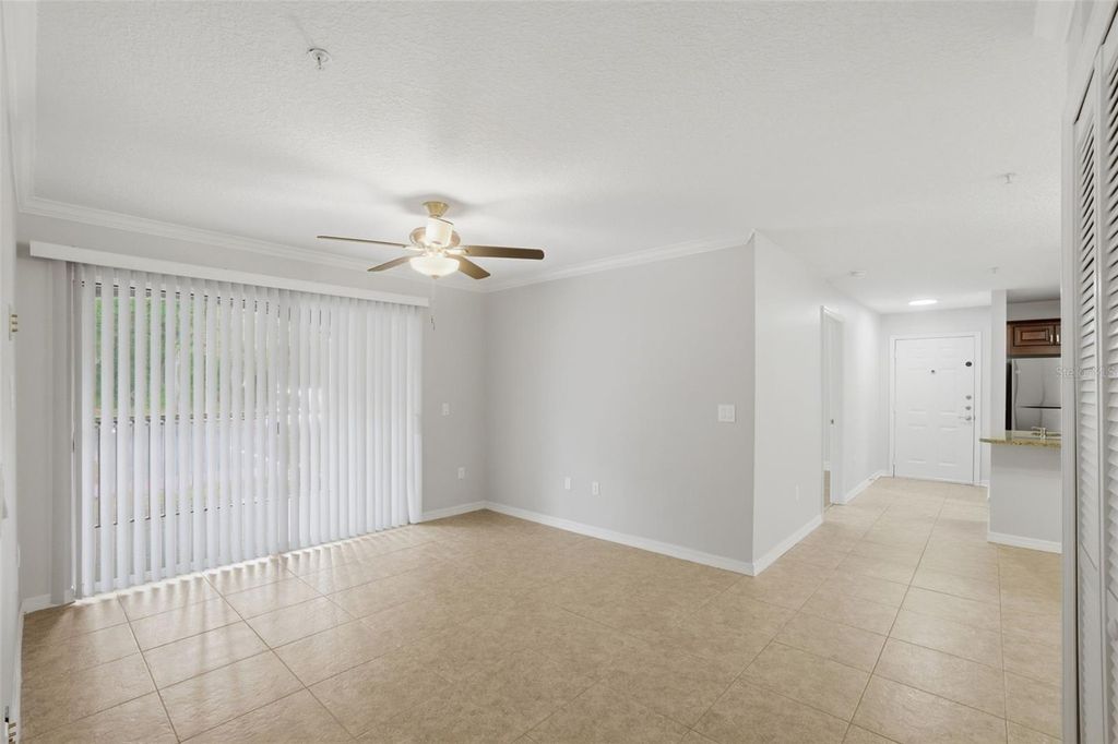 Photo of 1910 Summer Club Drive #104, Oviedo, FL 32765 (MLS # O6402379)