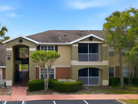 Photo of 1910 Summer Club Drive #104, Oviedo, FL 32765 (MLS # O6402379)
