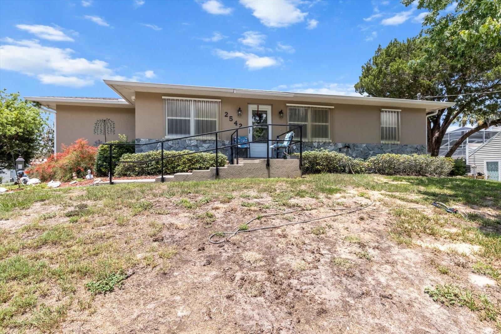 Waterfront "POOL" home with direct access to the Gulf! NEVER flooded!
3/2, tile throughout home, granite counters, huge walk in closet (12x12).
Florida room with air condiitoning 10'x40' whole house Generac generator, motor home metal carport (18x26), summer kitchen, seawall, boat lift. Two lots totalling .7 acres. Perfect for a VRBO or other short term rentals - custom built in 2001. New roof in 2019! You won't find a better value for a waterfront home that NEVER flooded.
