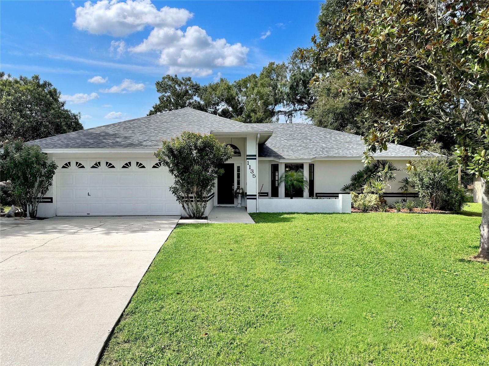 Discover this beautiful 3-bedroom, 2-bath home with a sparkling pool and the option for a 4th bedroom! Nestled in a desirable South Lakeland neighborhood, this property is located near sought-after schools and tucked away on a quiet street with no through traffic. The split floor plan offers a spacious living room with a cozy fireplace, perfect for family gatherings or relaxing evenings. The primary suite features a large walk-in closet and private bath, freshly painted and new flooring. The two additional bedrooms provide flexibility for guests, family, or a home office. Ample storage closets throughout the home add to its practicality. Step outside to your private backyard retreat with a screened pool and generous patio space for entertaining. The pool has been resurfaced, and new artificial turf has been added. Also, enjoy the brand-new grill and new patio furniture. Best of all, LAWN CARE AND POOL MAINTENANCE ARE INCLUDED for maintenance-free living. Conveniently located just minutes from shopping, dining, and major roadways. Se habla español.