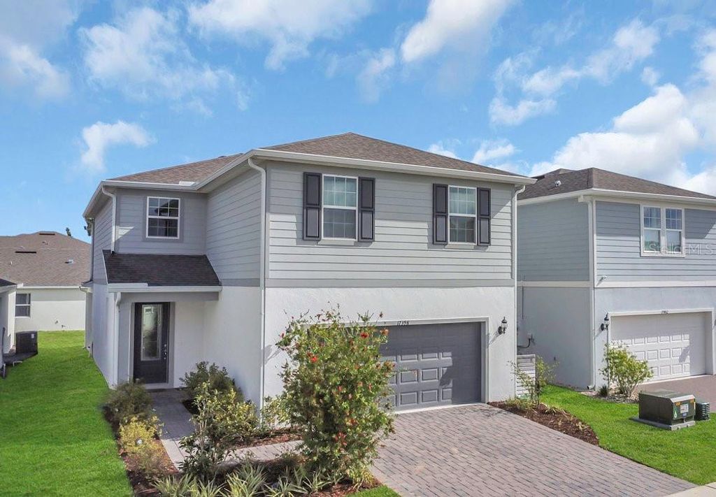 Photo of 17398 Saw Palmetto Ave, Clermont, FL 34714 (MLS # O6288465)